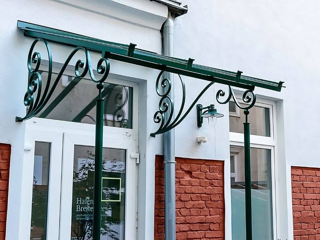Schmiedeeisen-Vordach mit Glas Schmiedeeisen-Vordach mit Glas