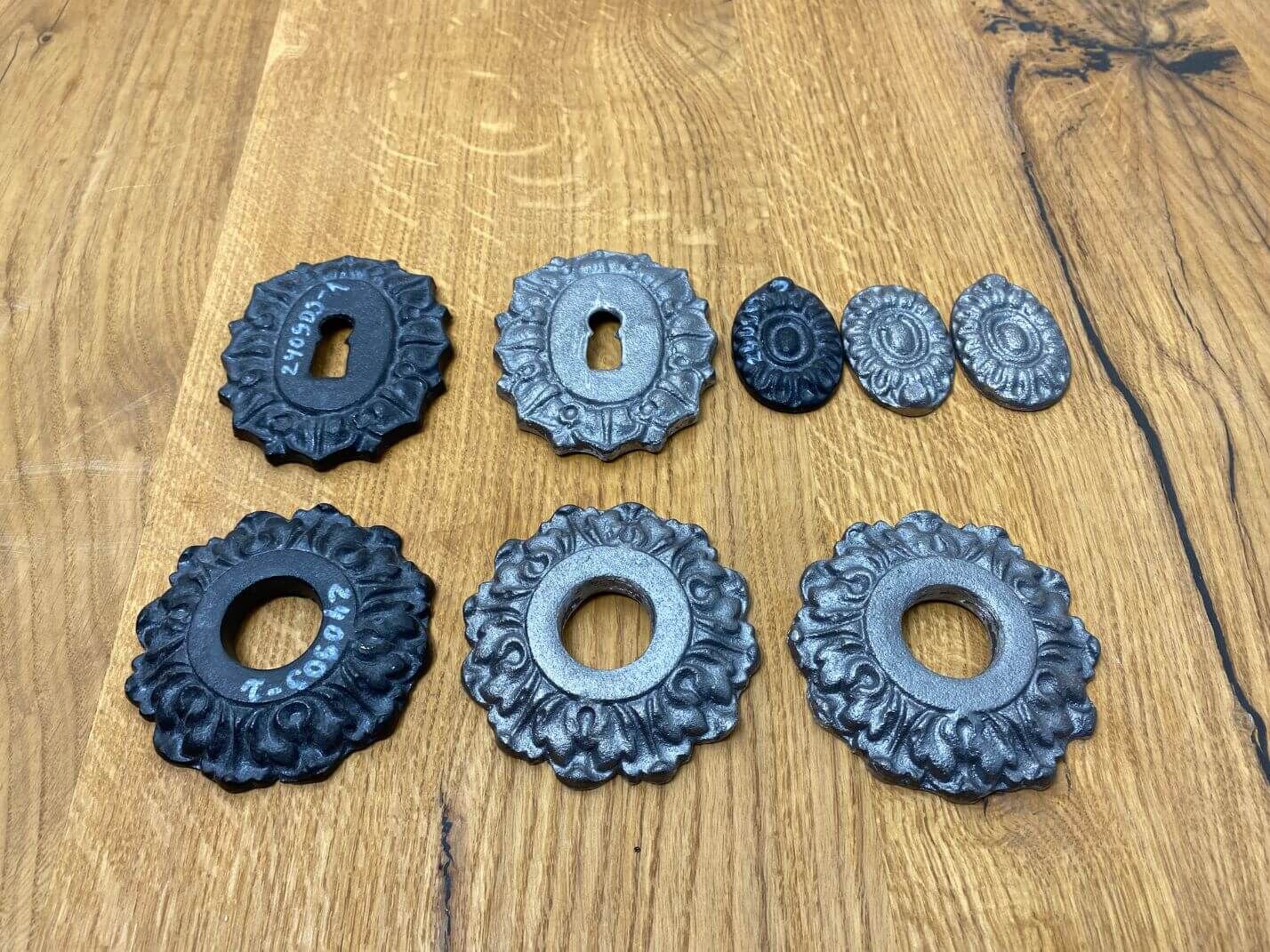 Reproduktion von historischen Schlüsselrosette bzw. Schlüssellochabdeckungen aus Gusseisen Reproduktion von historischen Schlüsselrosette bzw. Schlüssellochabdeckungen aus Gusseisen