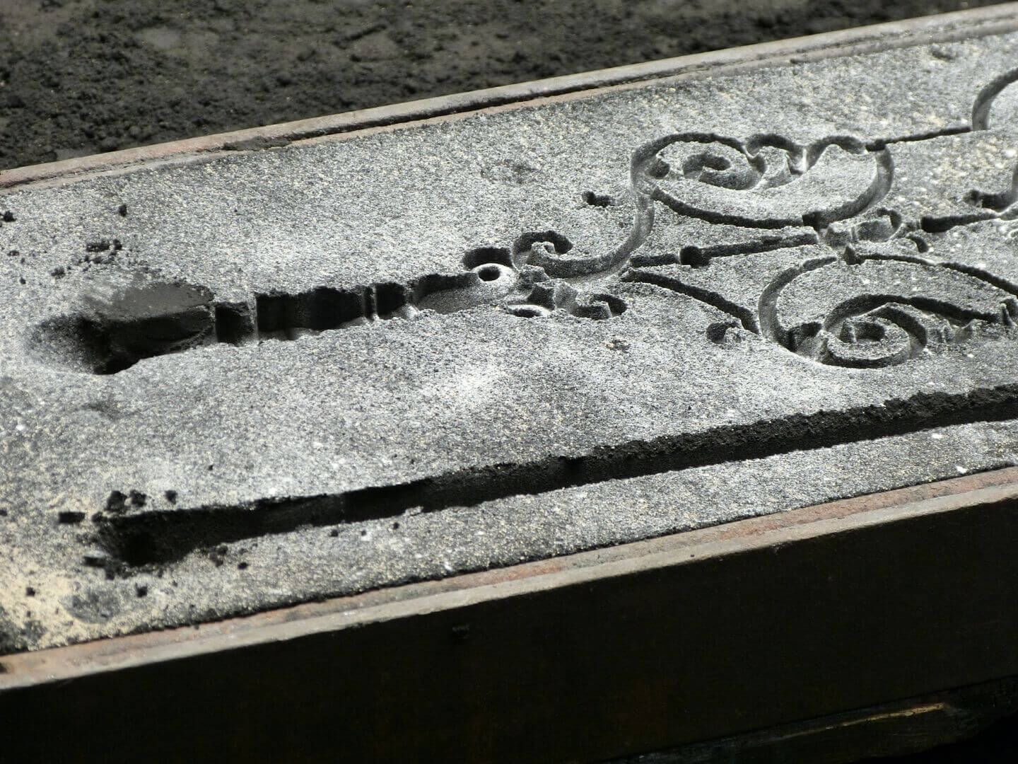 Reproduktion historischer Geländer: Detailaufnahme Sandform - unterer Teil