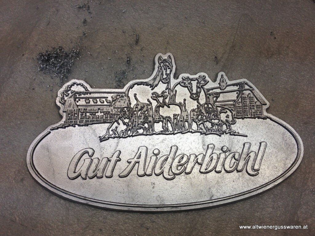 gut_aiderbichl_logo_wappen Firmenschild aus Aluminium, Messing & Bronzeguss - eigener Text/Muster