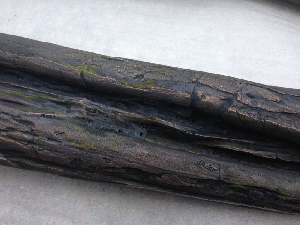 gelaendersteher-baumstaemme-bronzeguss-patiniert-abguss-drab-5