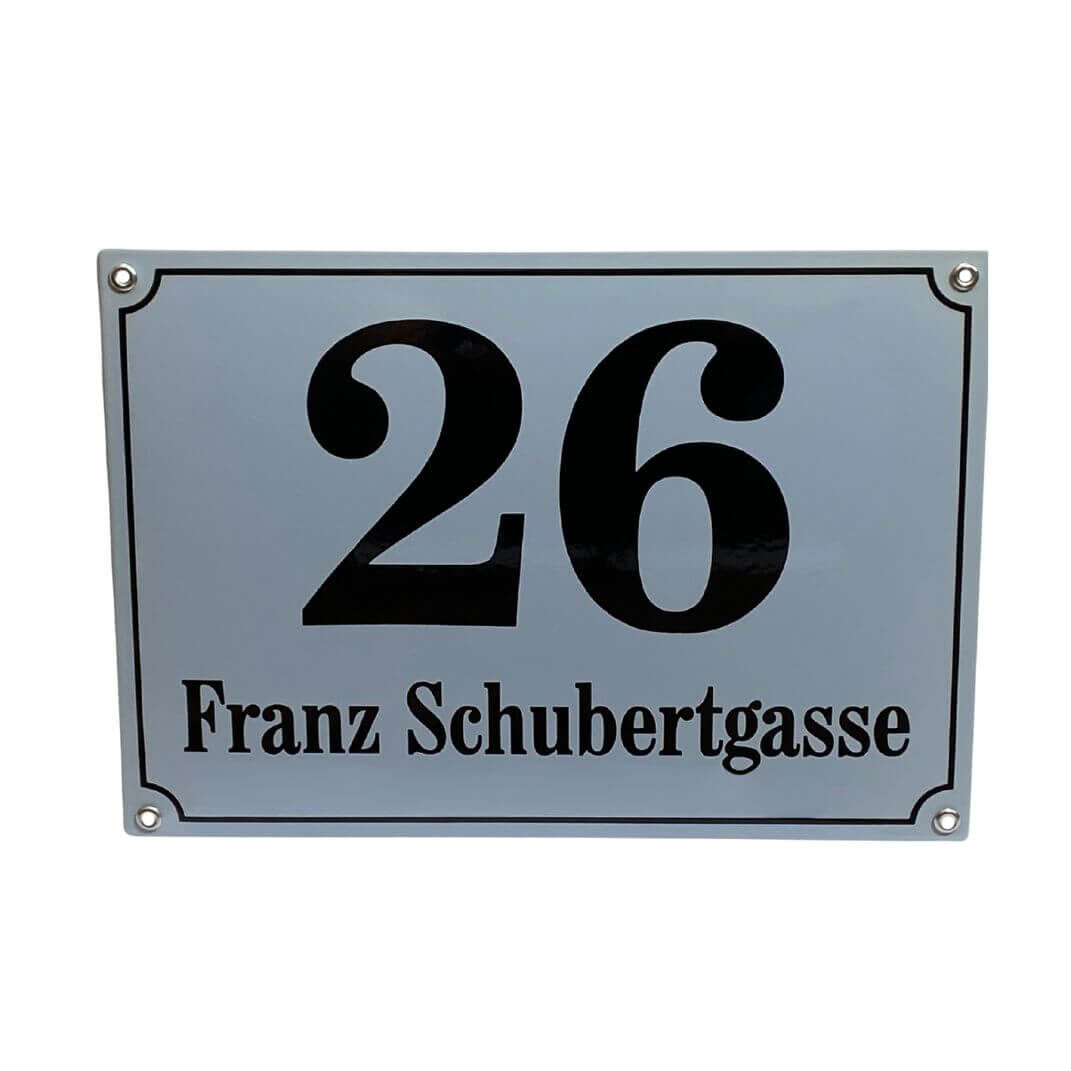 Hausnummerntafel aus emailliertem Stahlblech in Weiß-Schwarz Hausnummerntafel aus emailliertem Stahlblech in Weiß-Schwarz
